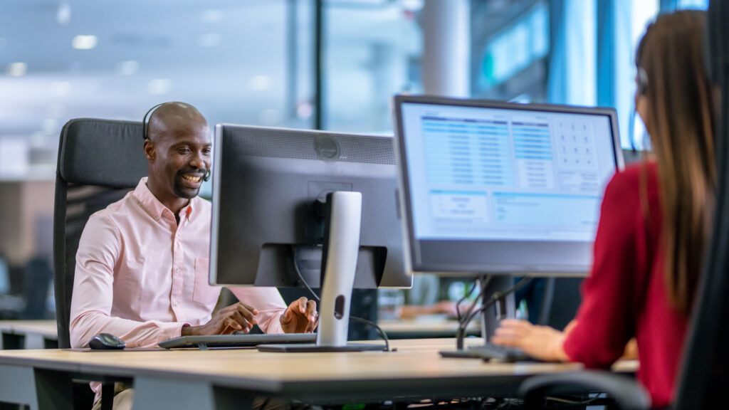 African-American man working as a call centre employee